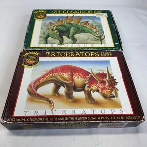 Glo Bones Lot of 2 Dinosaur Stegosaurus Triceratops Glow in the Dark Puzzles